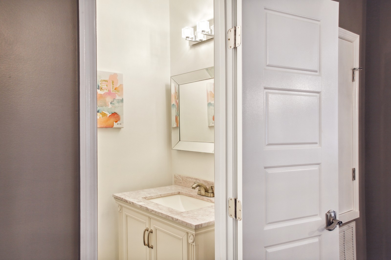 Main level powder room for the convenience of your guests.
